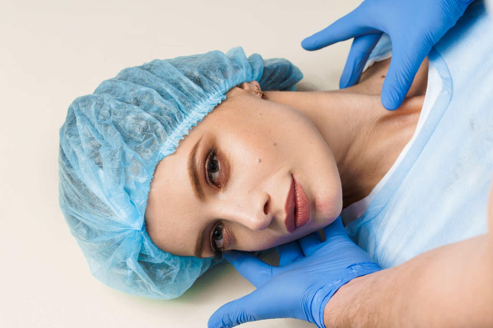 consultation with plastic surgeon white surface